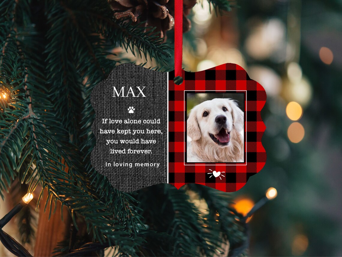 Red plaid ornament with image of pet. It says If love alone could have kept you here, yu would have lived forever. In loving memory, and the pet's name. It's benelux in shape.