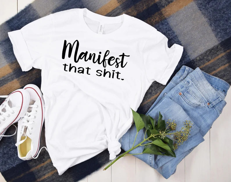 Manifest that shit unisex t-shirt - Designs by Tangsley