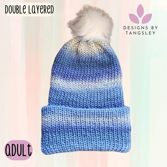 Light blue and off-white double knitted beanie with brim and white pompom
