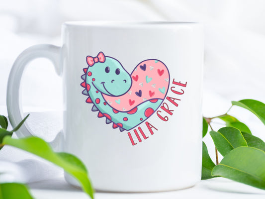 White coffee mug with a dinosaur in a heart personalized with child's name