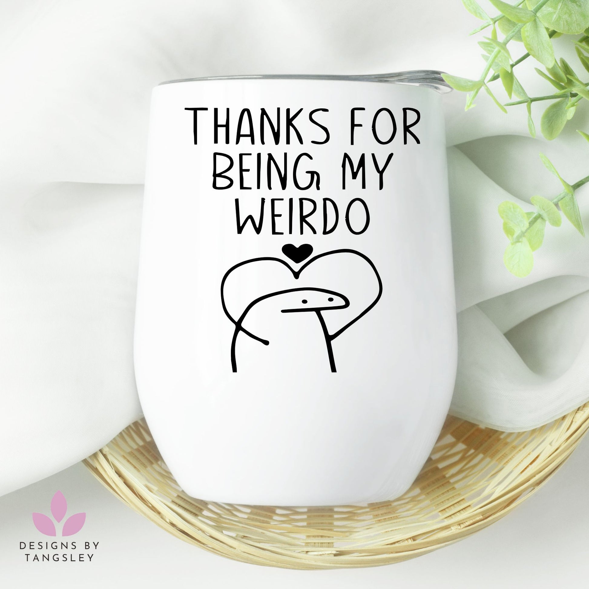 White wine glass tumbler that says THANKS FOR BEING MY WEIRDO. With a person holding their hands above their head in a heart shape.