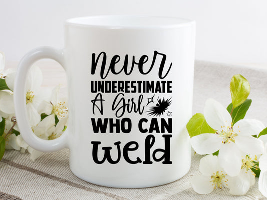 Never underestimate a girl who can weld coffee mug