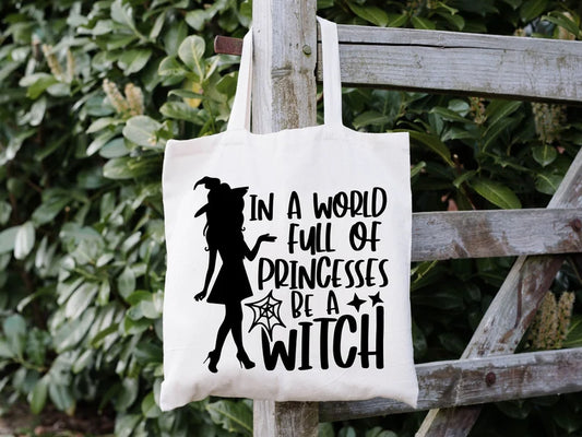 In a world full of princesses be a witch canvas tote bag